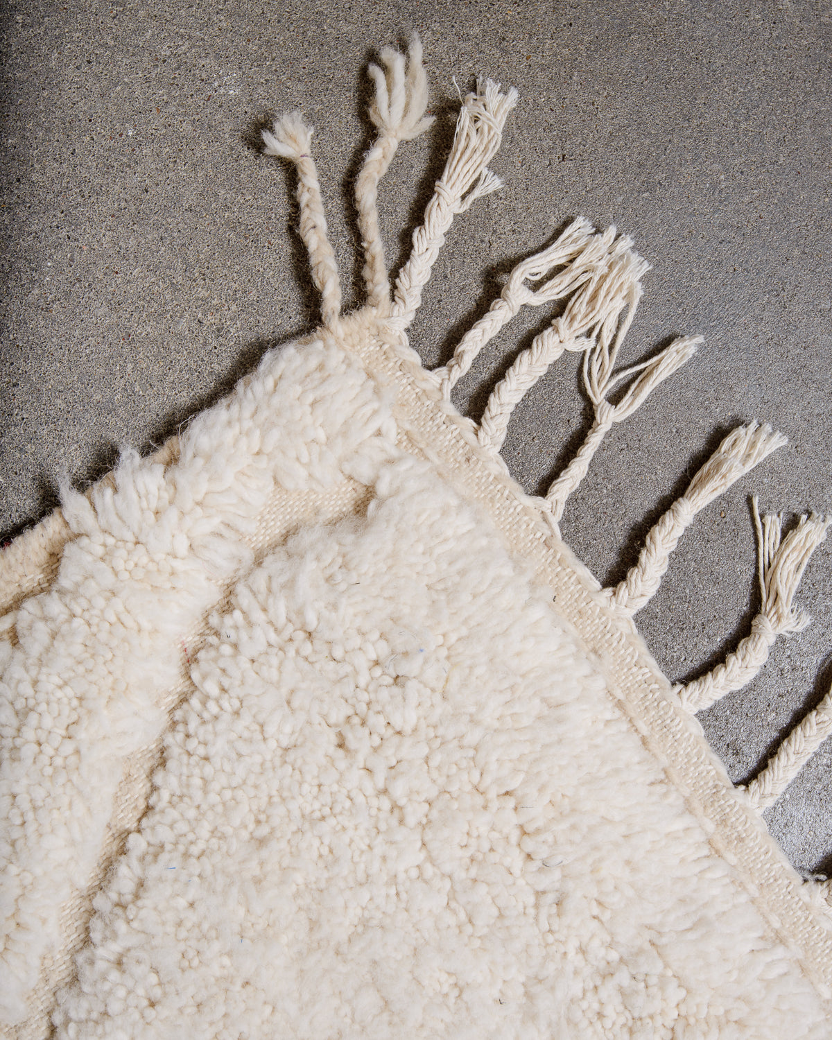 Modern, designer, handcrafted Berber rug from Morocco. Beniourain carpet with beautiful colours and patterns and fluffy wool texture.